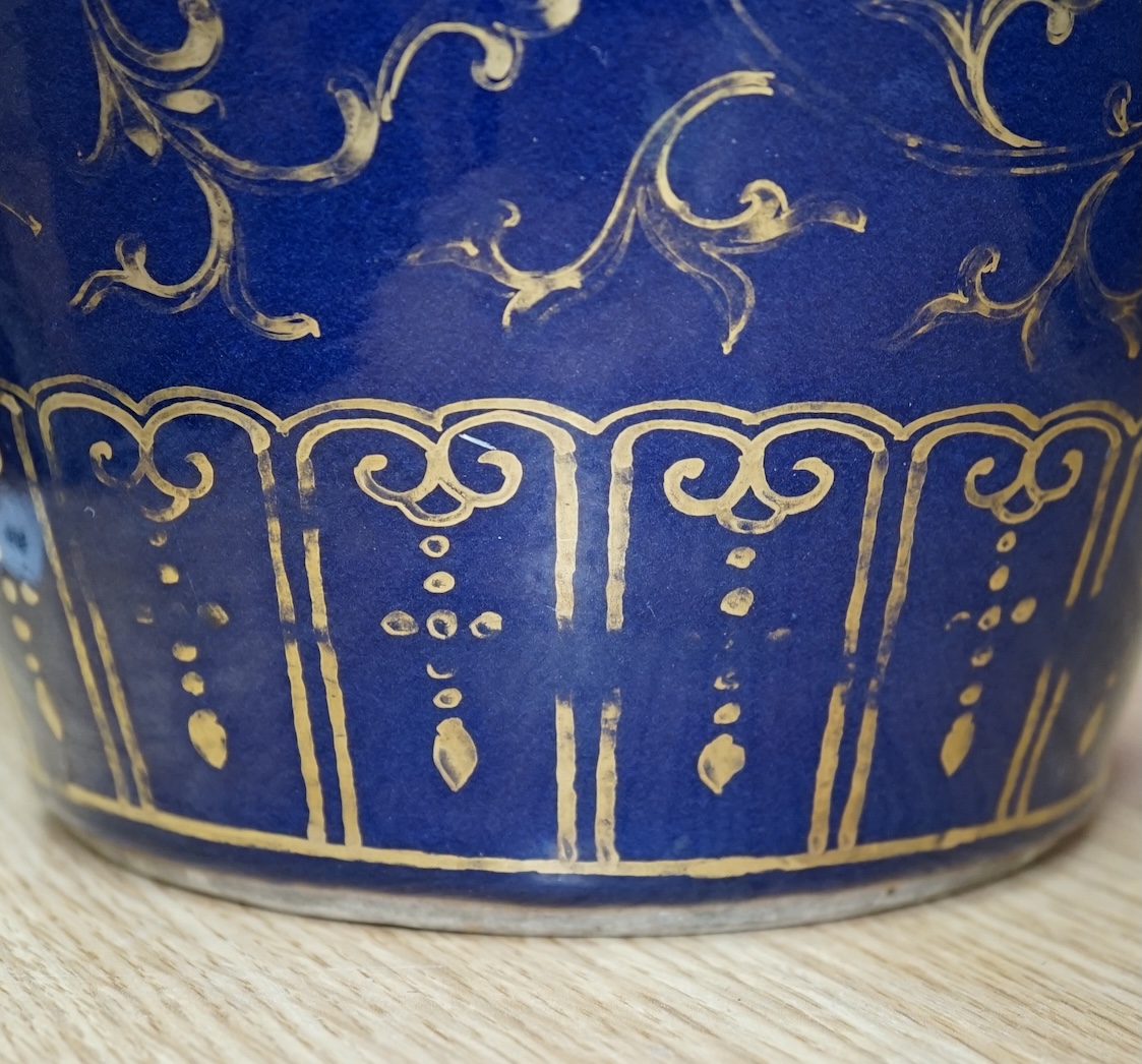 A Chinese gilt decorated blue glazed vase, early 19th century, 48.5cm high. Condition - one side has a large oval break which as been reglued, the gilt decoration is rubbed